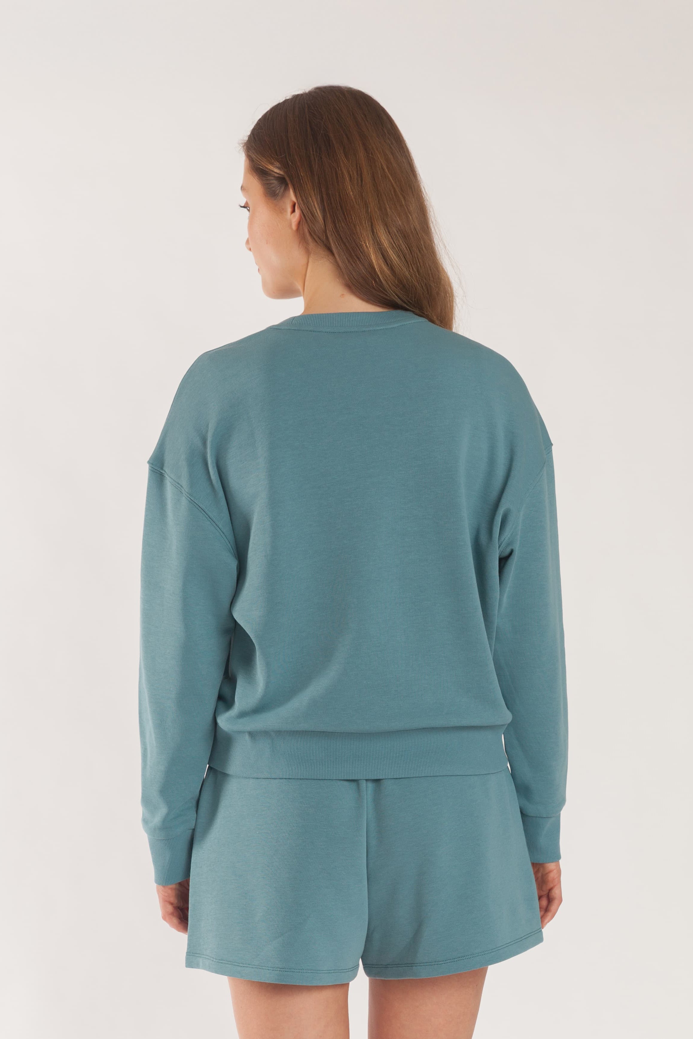 Kiara Crewneck French terry sweatshirt in tidal blue